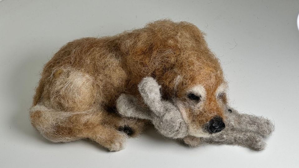 3D Pet Portrait of a brown dog sleeping holding a rabbit toy in felt