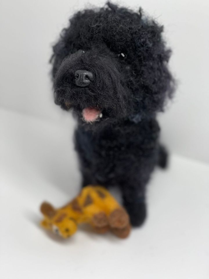 3D Pet Portrait of a black dog with a giraffe toy in felt